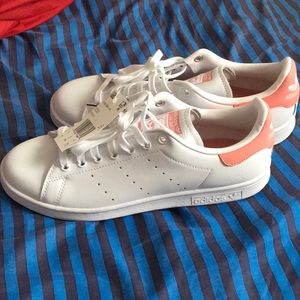 Pink and white adidas Stan Smith